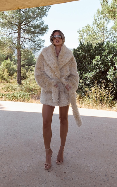 Manteau en fausse fourrure crème à col oversize
