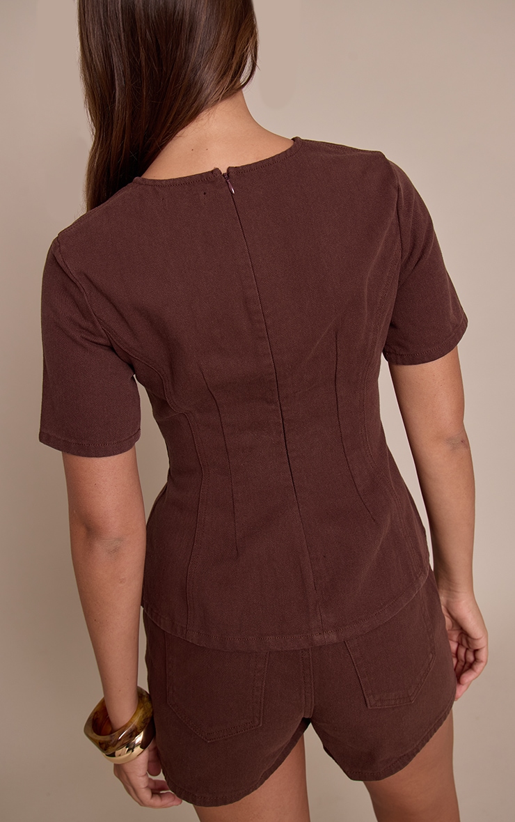 Top en denim chocolat à basque et taille cintrée. image 2