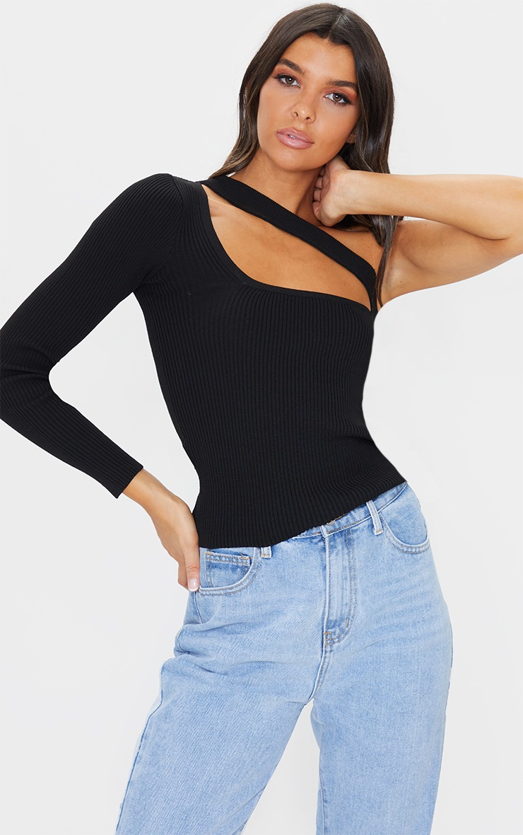 Top en maille noire à manche longue unique et découpe