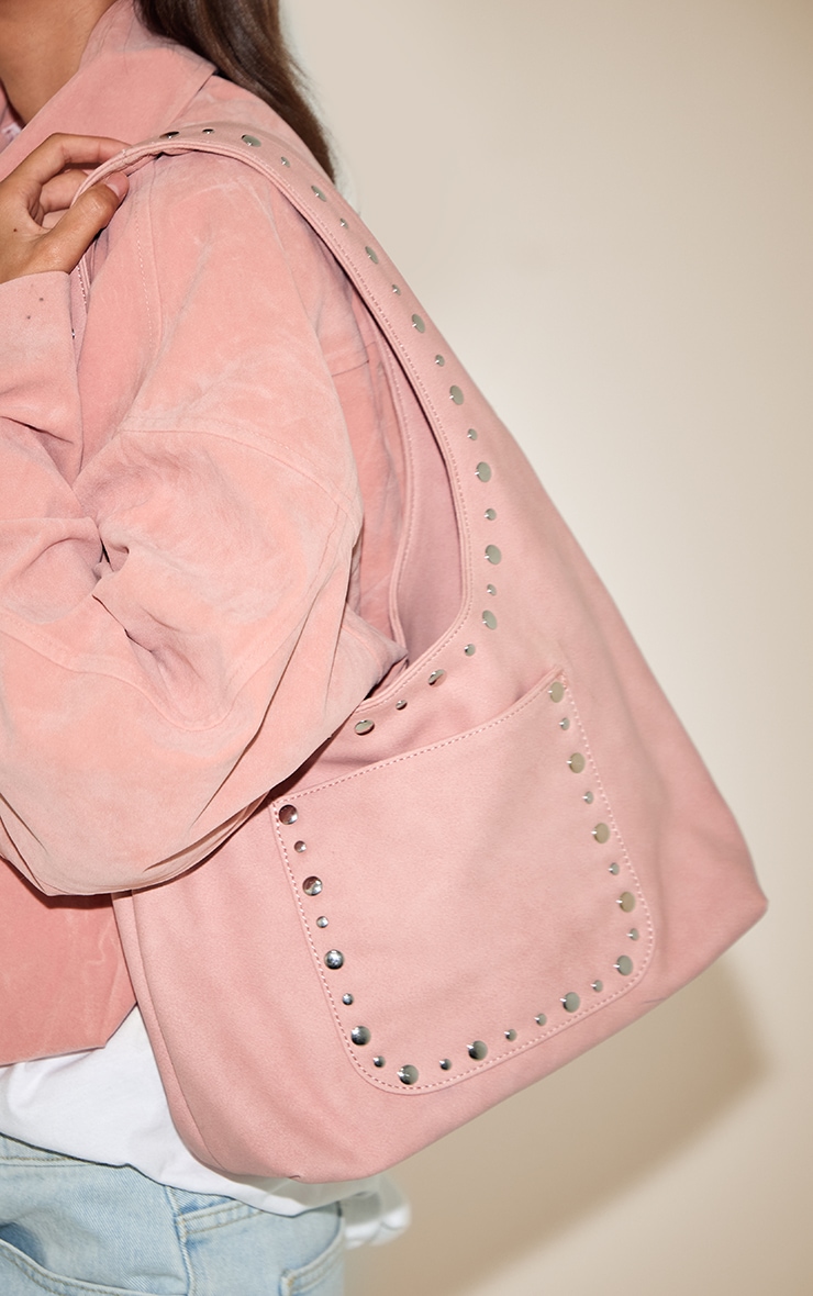 Sac à main en suédine rose poudré à clous image 1