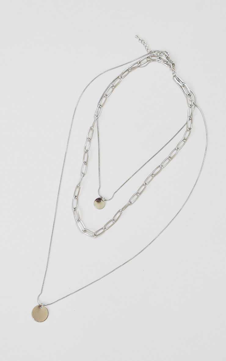 Collier superposé argenté à piécettes