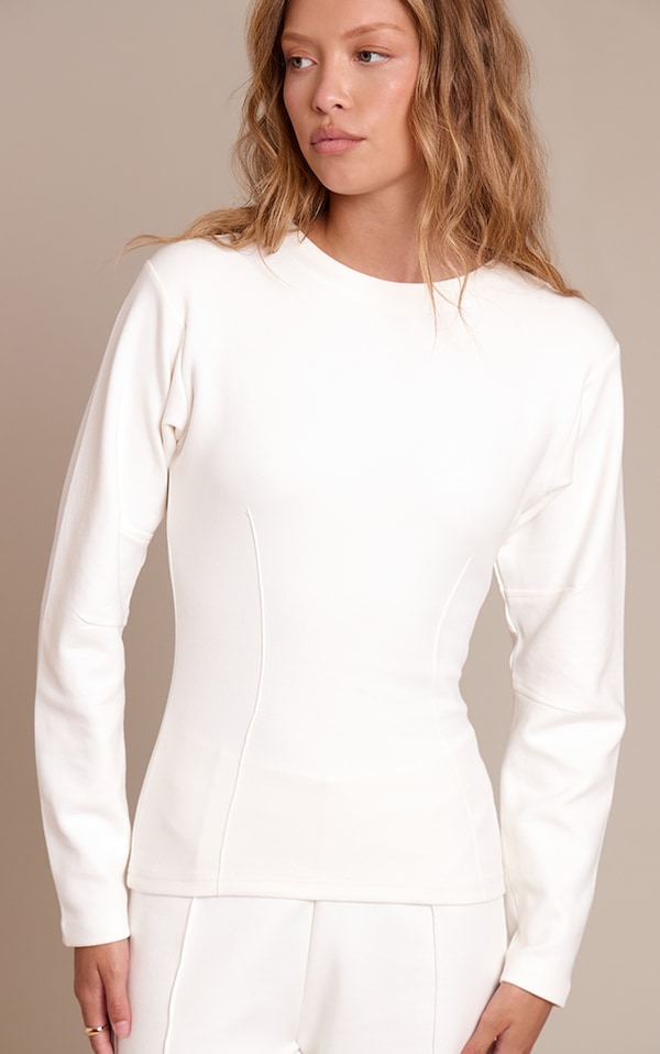 Sweat en maille tricot interlock crème à taille resserrée