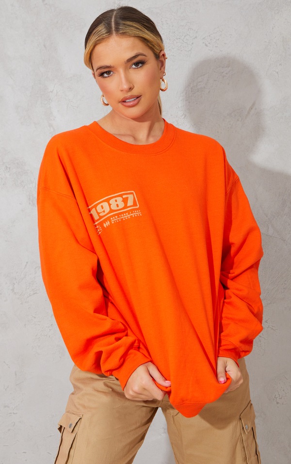 Orange World Tour Slogan Sweatshirt Tops PrettyLittleThing IRE