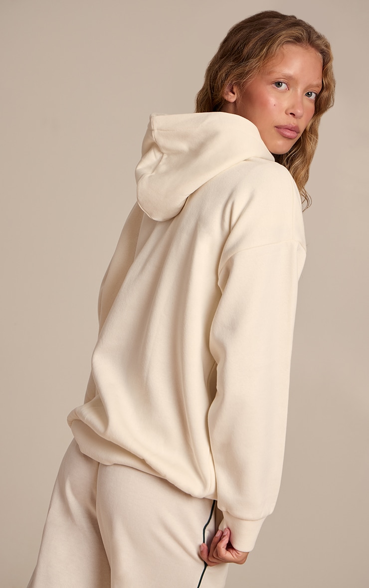 Hoodie oversize crème à logo "PLT" image 2