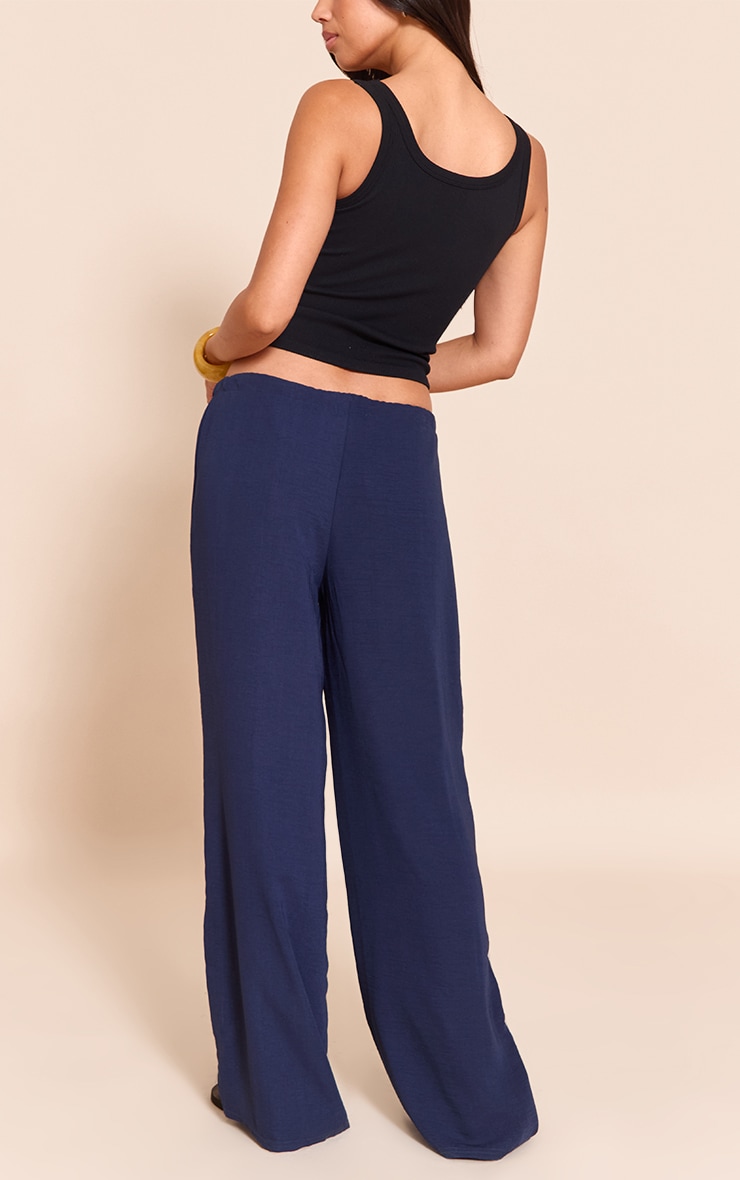 Pantalon fluide bleu marine à taille fine et cordons ajustables image 3