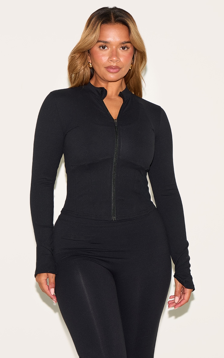 Shape Veste de sport noire à zip devant et liséré sous le buste image 1