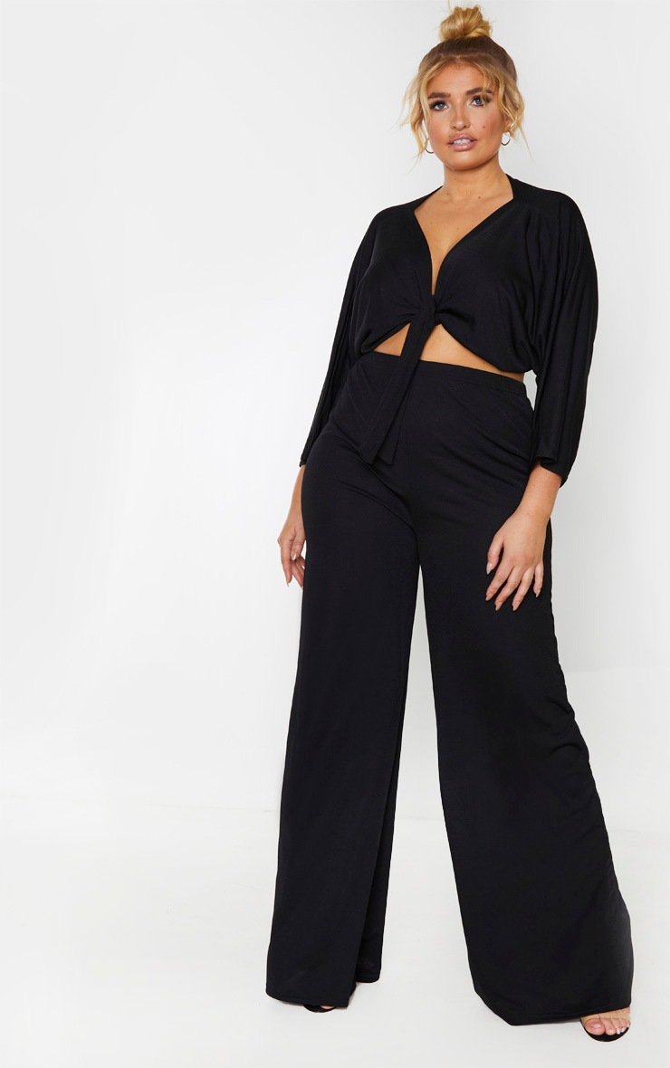 PLT Plus - Pantalon en crêpe noir à jambes évasées