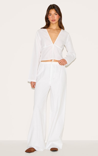 Pantalon large blanc à cordons ajustables