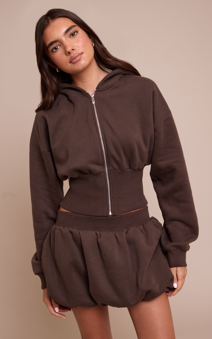Veste cintrée en sweat marron à doublure en polaire et zip image 1