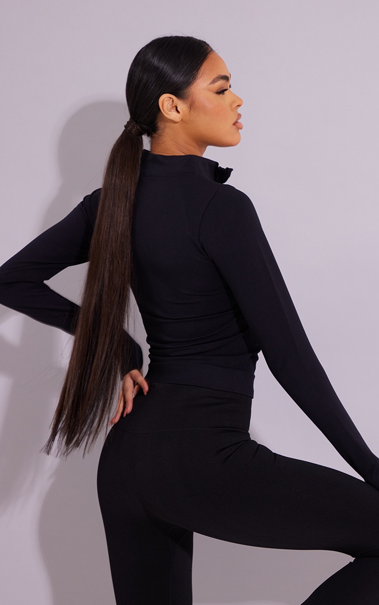 Veste de sport noire basique sans coutures | PrettyLittleThing FR