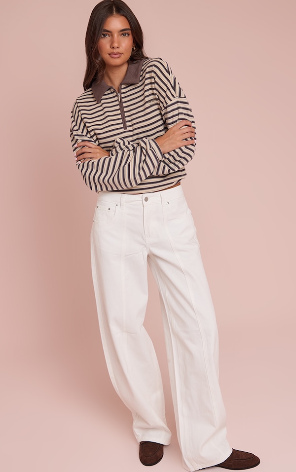 Jean style bouffant blanc à taille basse et coutures devant
