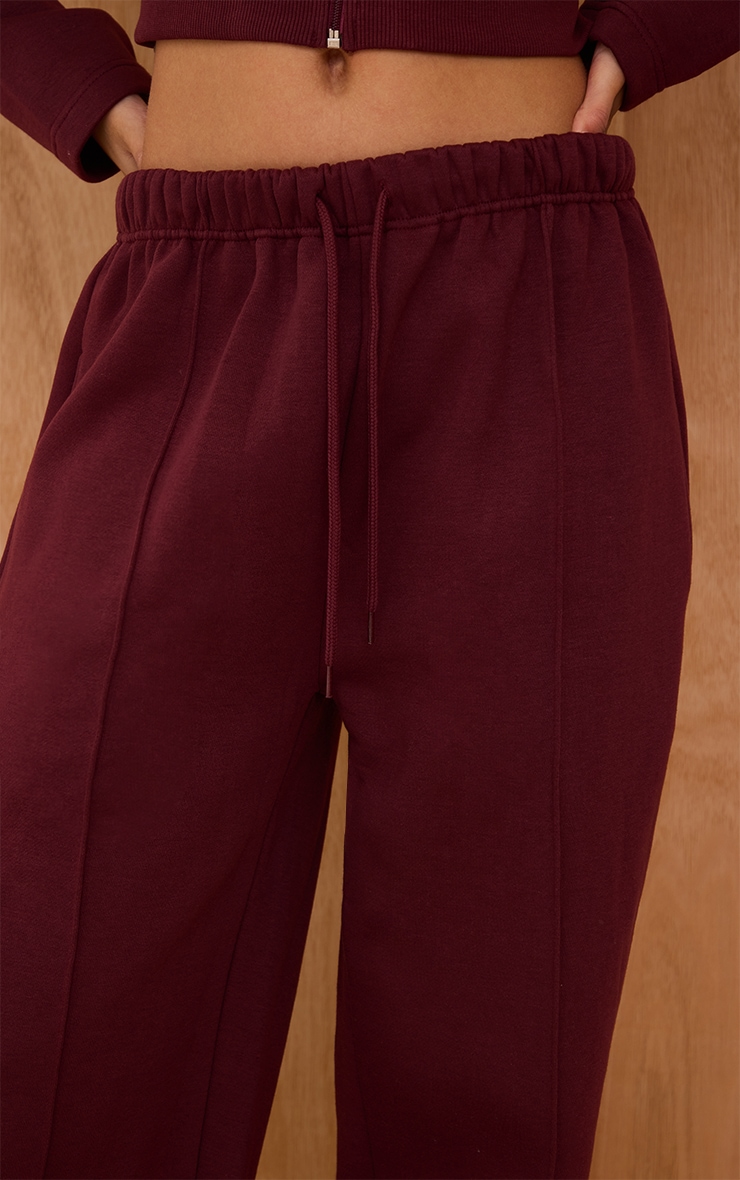 Jogging large rouge vin à coutures surjetées image 4