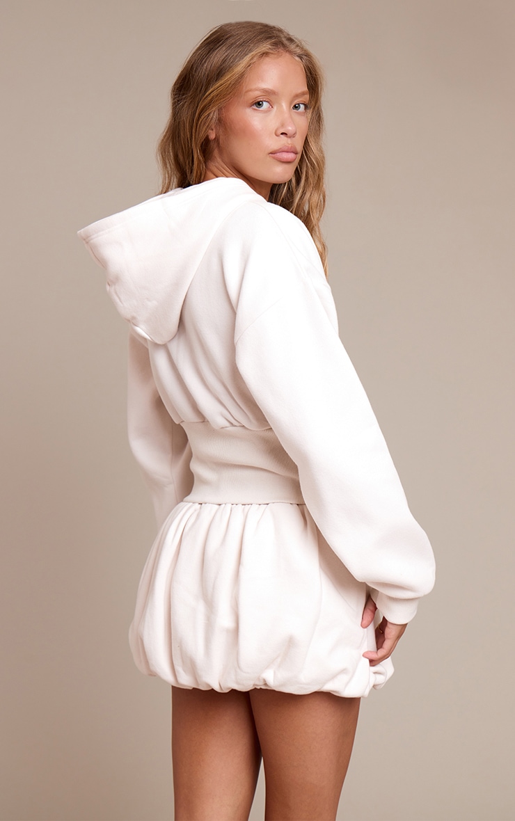Veste cintrée en sweat crème à doublure en polaire et zip image 2