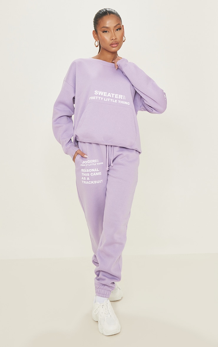 purple graphic sweater