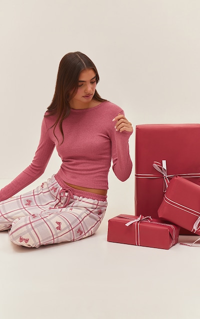 Ensemble de pyjama top ajusté et pantalon en maille pointelle rouge imprimé noeuds à manches longues
