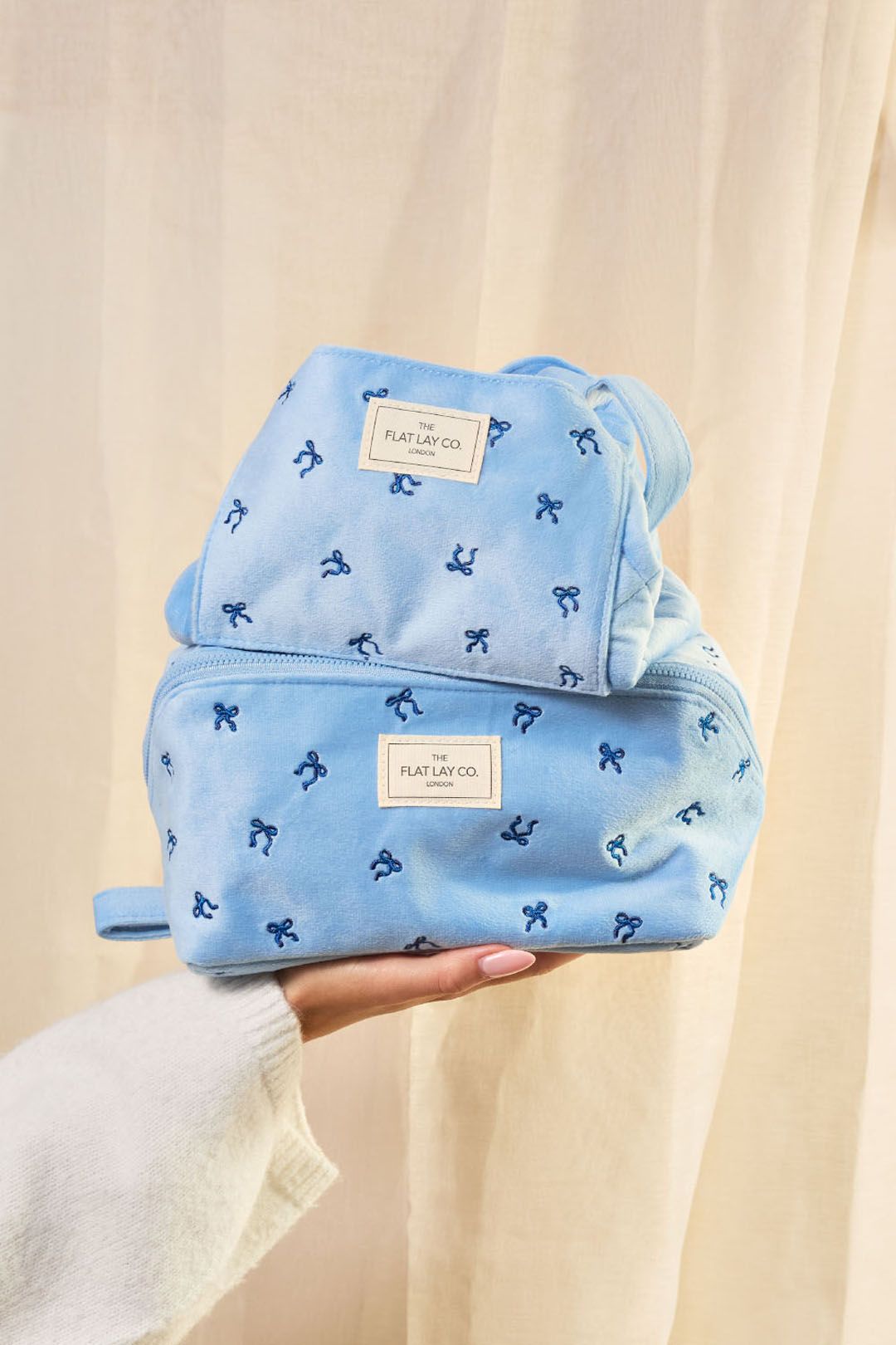 The Flat Lay Co Drawstring Makeup Bag - Ditsy Bows Blue Embroidered Velvet Multi image 3