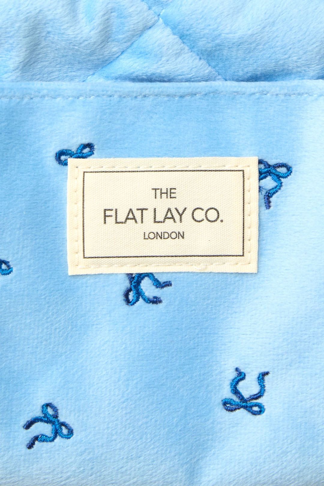 The Flat Lay Co Drawstring Makeup Bag - Ditsy Bows Blue Embroidered Velvet Multi image 9