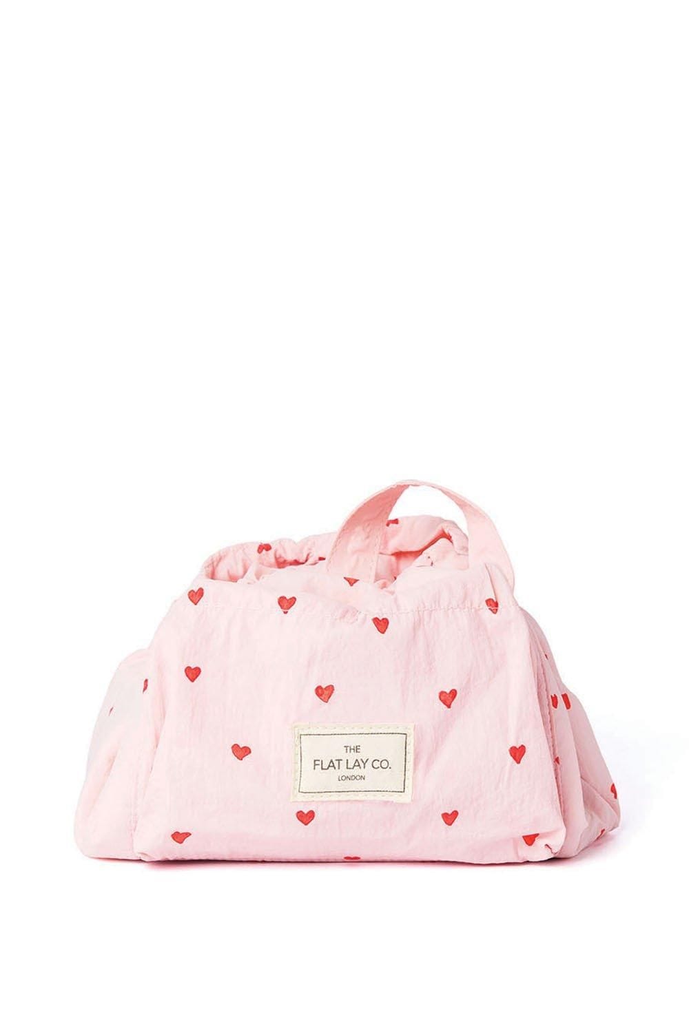 The Flat Lay Co Drawstring Makeup Bag in Sweet Pink Hearts Parachute Multi