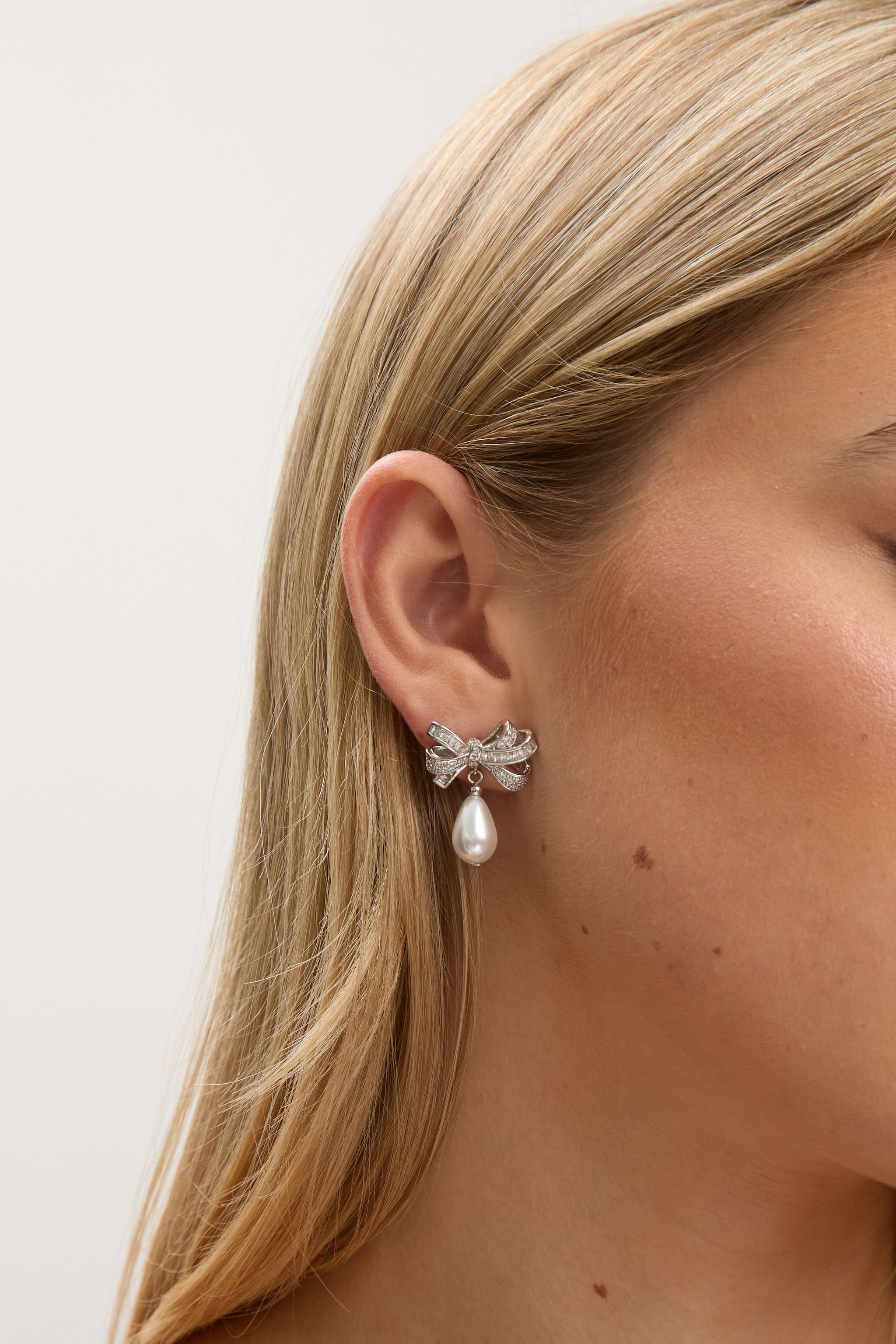 Jon Richard Rhodium Plated Cubic Zirconia Bow and Pearl Earrings image 2