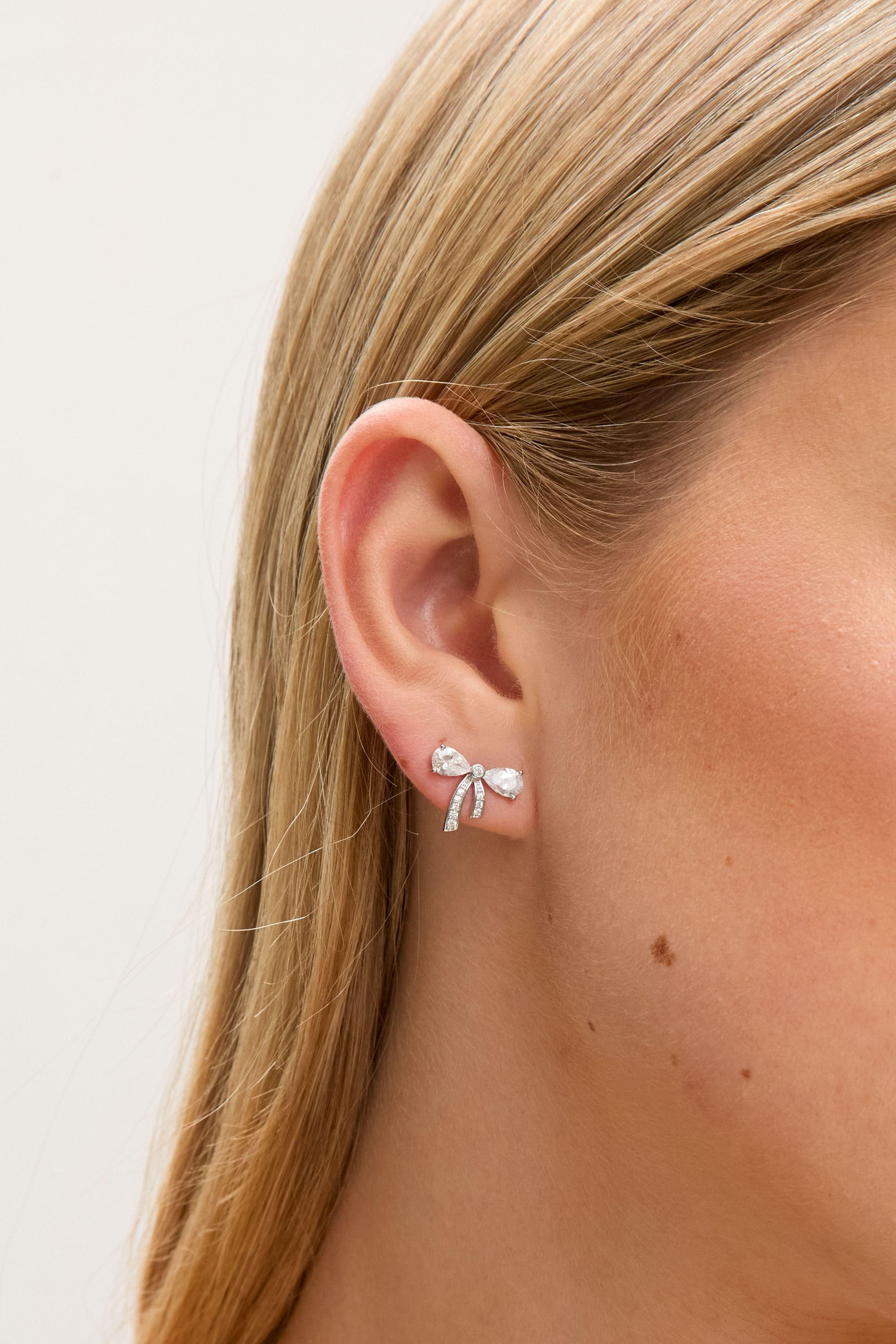 Jon Richard Rhodium Plated Cubic Zirconia and Pave Small Bow Studs image 2