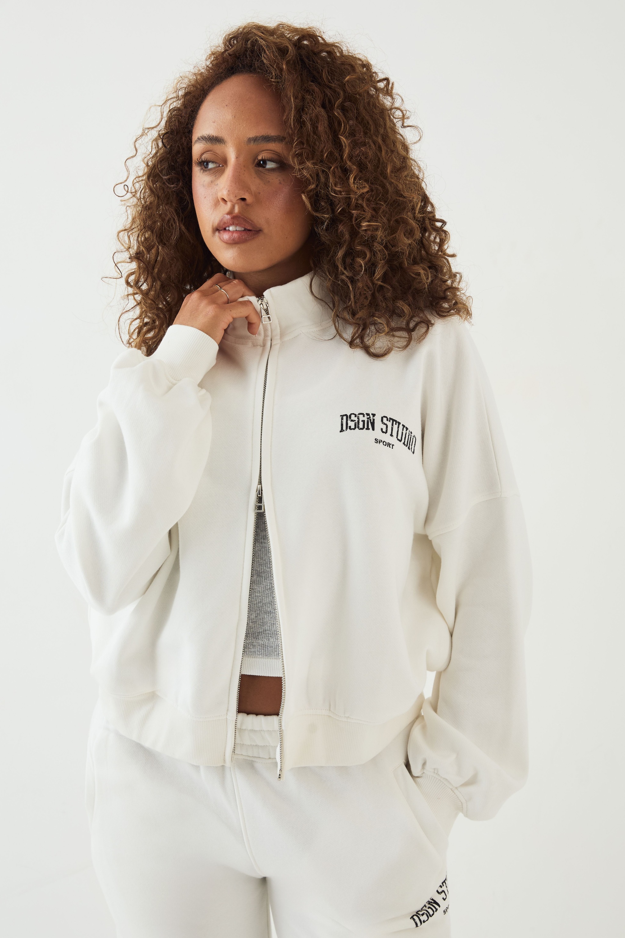 DSGN Studio DSGN Studio Collegiate Printed Zip Through Funnel Neck Bomber Sweatshirt Cream