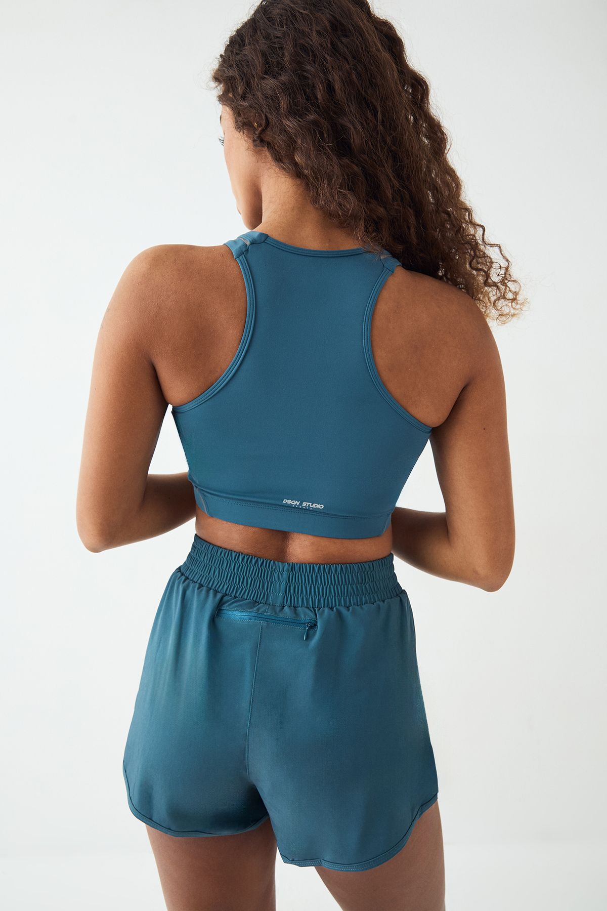 DSGN Studio DSGN Studio Reflective Binding Ultra Sculpt Sports Bra Teal image 2
