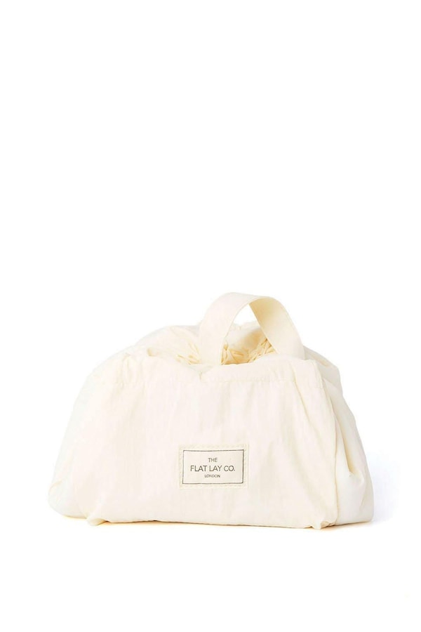 The Flat Lay Co Drawstring Makeup Bag in Vanilla Parachute Multi