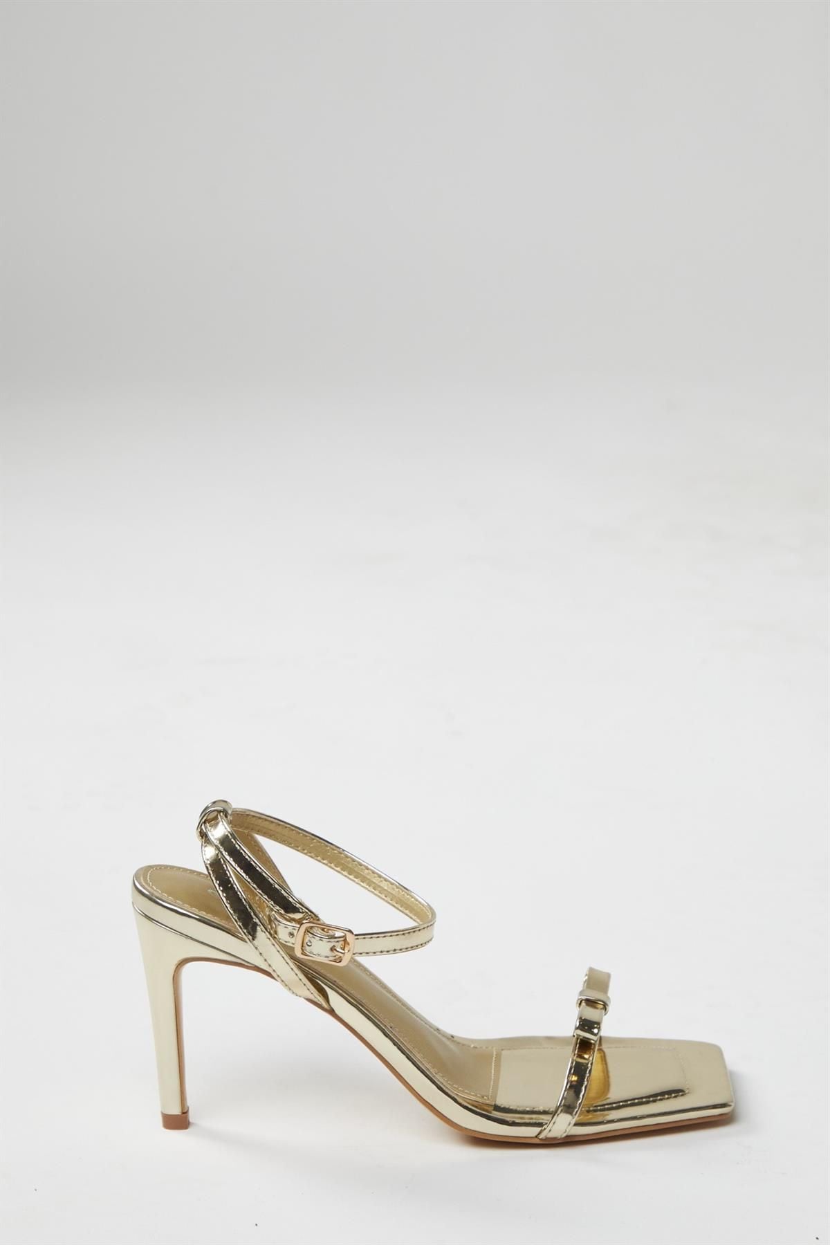 Shnoo Gold Strappy Bow Barely There-Heels